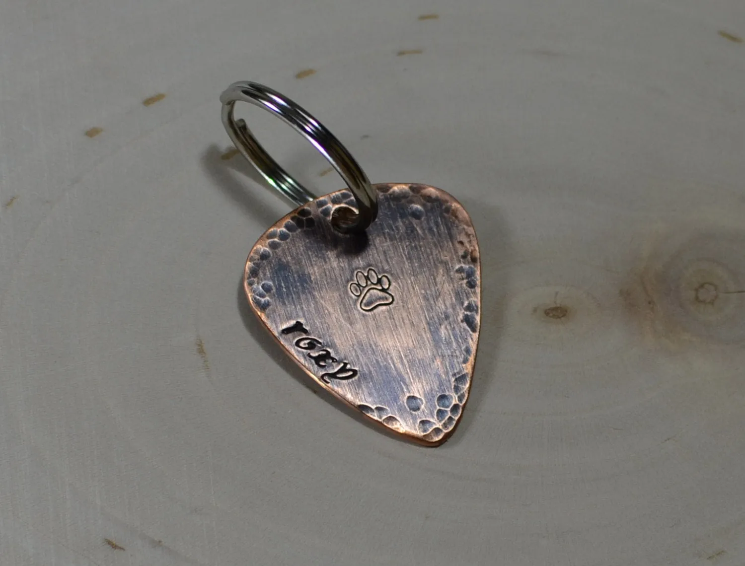 Guitar pick dog tag with rustic hammered finish